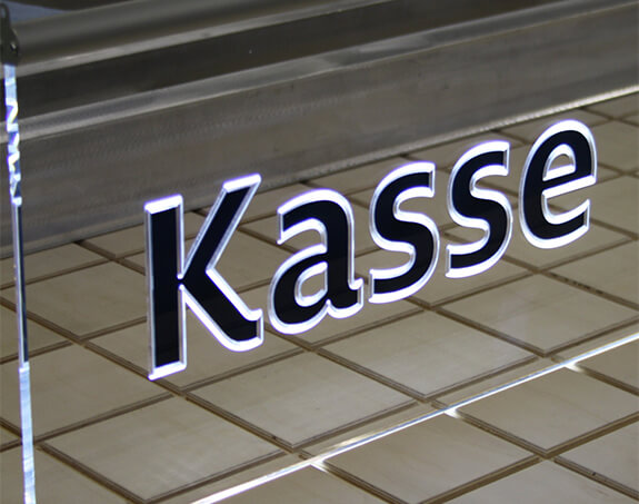 Acrylschild Kasse mit LED-Fluter